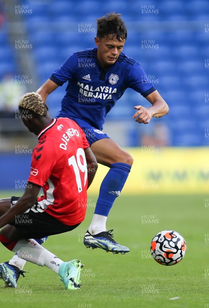 270721 - Cardiff City v Southampton, Pre-season Friendly - Perry Ng of Cardiff City takes on Moussa Djenepo of Southampton