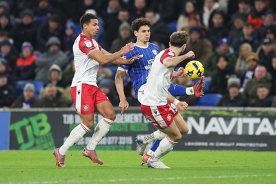 291225 - Cardiff City v Stevenage, EFL Sky Bet League 1 - Yousef Salech of Cardiff City takes on Luther James-Wildin of Stevenage and Charlie Goode of Stevenage