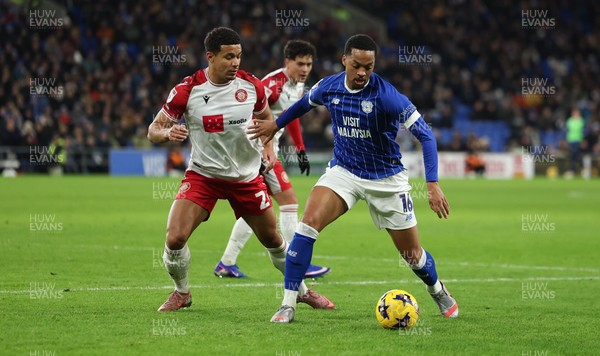 291225 - Cardiff City v Stevenage, EFL Sky Bet League 1 - Chris Willock of Cardiff City holds off Luther James-Wildin of Stevenage