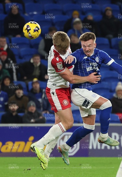 291225 - Cardiff City v Stevenage, EFL Sky Bet League 1 - Isaak Davies of Cardiff City heads at goal as Carl Piergianni of Stevenage challenges