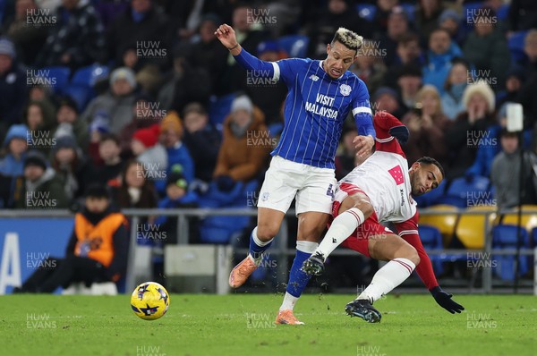 291225 - Cardiff City v Stevenage, EFL Sky Bet League 1 - Callum Robinson of Cardiff City and Louis Thompson of Stevenage compete for the ball