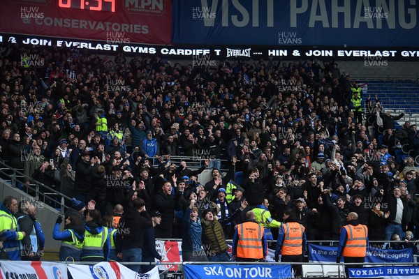 240126 - Cardiff City v Stockport County - Sky Bet League 1 - Stockport fans celebrate after their side scores the first goal of the game