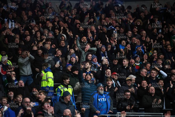 240126 - Cardiff City v Stockport County - Sky Bet League 1 - Stockport fans celebrate after their side scores the first goal of the game