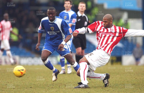 110206 - Cardiff City v Stoke City Cardiff's GuyLain Ndumbu Nsungu and Michael Duberry compete  