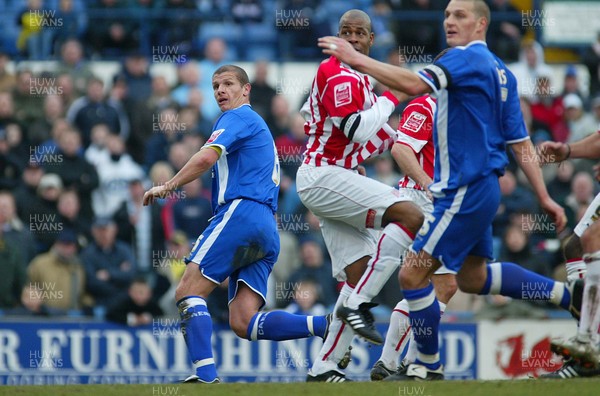 110206Cardiff City v Stoke Cardiff's Neil Cox (left) watches as he finds the back of the net to score City's third goal 