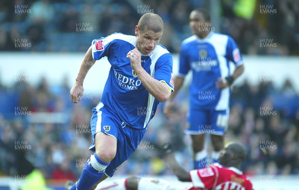 110206Cardiff City v Stoke Cardiff's Neil Cox sets off on his celebratory run after scoring his first goal 