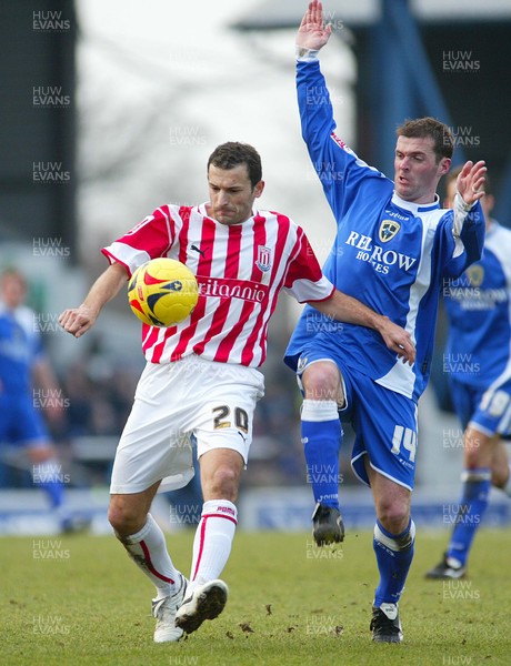 110206Cardiff City v Stoke Stokes Josip Skoko holds off Willie Boland 