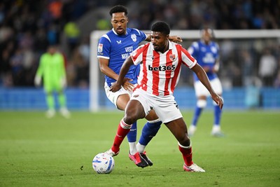 080926 - Cardiff City v Stoke City - Sky Bet Championship - Chris Willock of Cardiff City is challenged by Djibril Soumare of Stoke