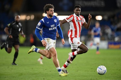 080926 - Cardiff City v Stoke City - Sky Bet Championship - Ollie Tanner of Cardiff City is challenged by Djibril Soumare of Stoke