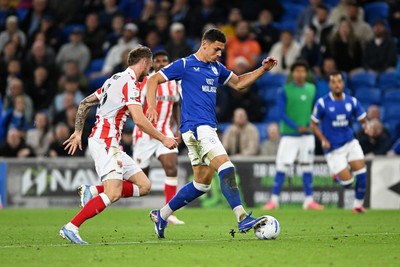 080926 - Cardiff City v Stoke City - Sky Bet Championship - Yousef Salech of Cardiff City is challenged by Svante Ingelsson of Stoke