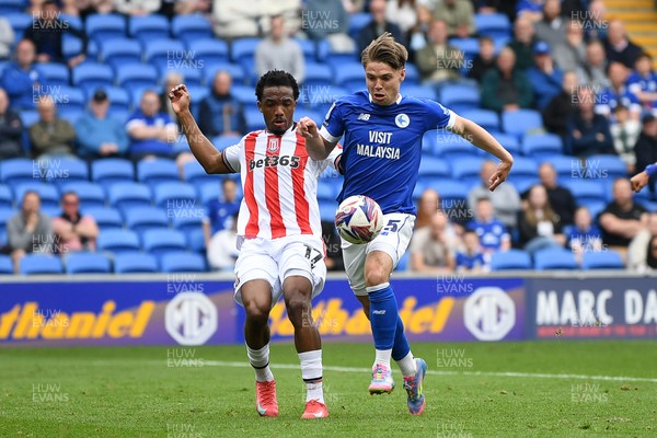 120425 - Cardiff City v Stoke City - Sky Bet Championship - Cian Ashford of Cardiff City is challenged by Eric Bocat of Stoke City