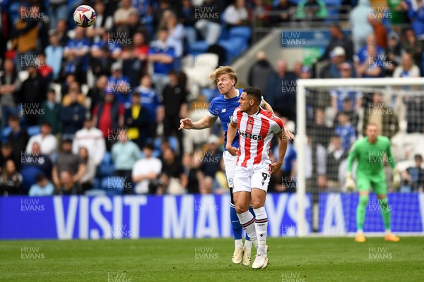120425 - Cardiff City v Stoke City - Sky Bet Championship - Jesper Daland of Cardiff City is challenged by Ali Al-Hamadi of Stoke City