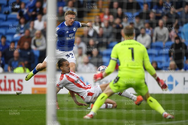 120425 - Cardiff City v Stoke City - Sky Bet Championship - Isaak Davies of Cardiff City has his shot saved by Viktor Johansson of Stoke City
