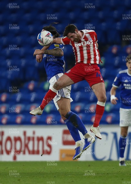 160321 Cardiff City v Stoke City, Sky Bet Championship - Marlon Pack of Cardiff City and Joe Allen of Stoke City compete for the ball