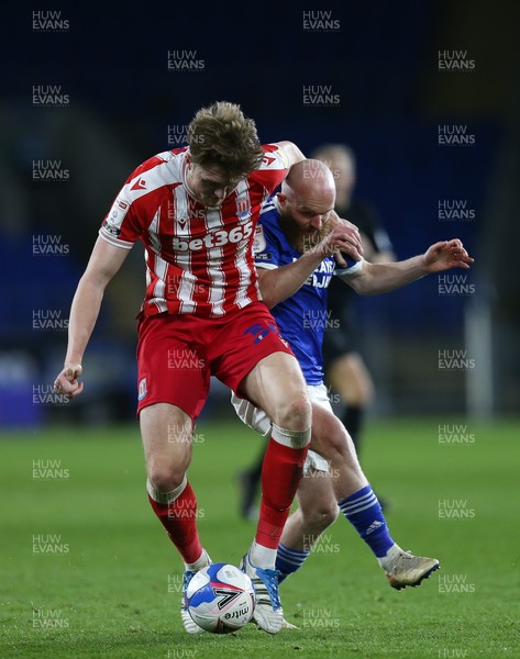 160321 Cardiff City v Stoke City, Sky Bet Championship - Harry Souttar of Stoke City and Jonny Williams of Cardiff City compete for the ball