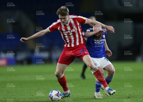 160321 Cardiff City v Stoke City, Sky Bet Championship - Harry Souttar of Stoke City and Jonny Williams of Cardiff City compete for the ball