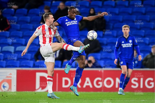 160322 - Cardiff City v Stoke City - Sky Bet Championship - Ben Wilmot of Stoke City vies for possession with Uche Ikpeazu of Cardiff City