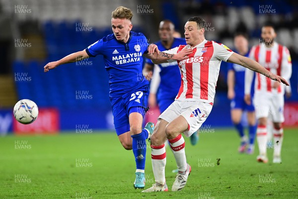 160322 - Cardiff City v Stoke City - Sky Bet Championship - Isaak Davies of Cardiff City battles with James Chester of Stoke City 