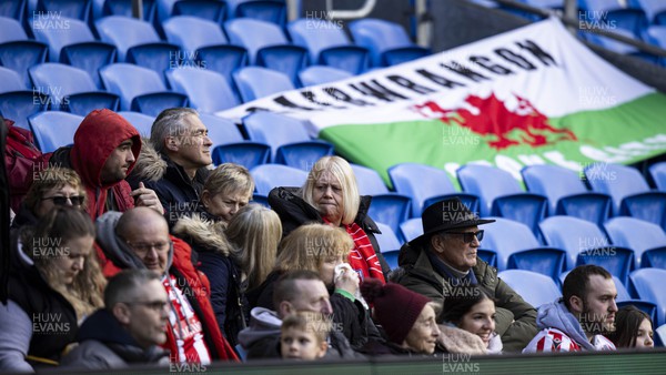 240224 - Cardiff City v Stoke City - Sky Bet Championship - Stoke City supporters with a welsh flag