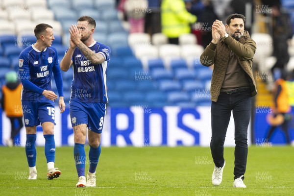 240224 - Cardiff City v Stoke City - Sky Bet Championship - Cardiff City manager Erol Bulut & Joe Ralls of Cardiff City applaud the fans at full time