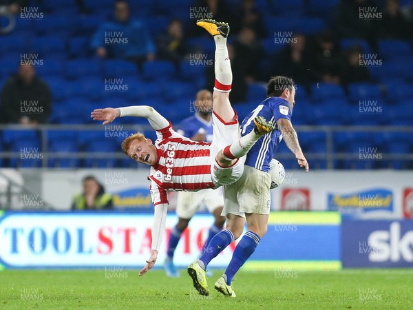 261119 - Cardiff City v Stoke City, Sky Bet Championship - Ryan Woods of Stoke City is upended during a challenge from Lee Tomlin of Cardiff City