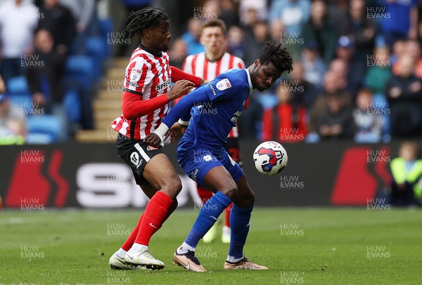 100423 - Cardiff City v Sunderland - SkyBet Championship - Sory Kaba of Cardiff City is challenged by Pierre Ekwah of Sunderland