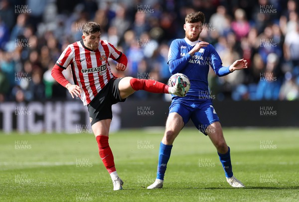 100423 - Cardiff City v Sunderland - SkyBet Championship - Lynden Gooch of Sunderland is challenged by Jack Simpson of Cardiff City 