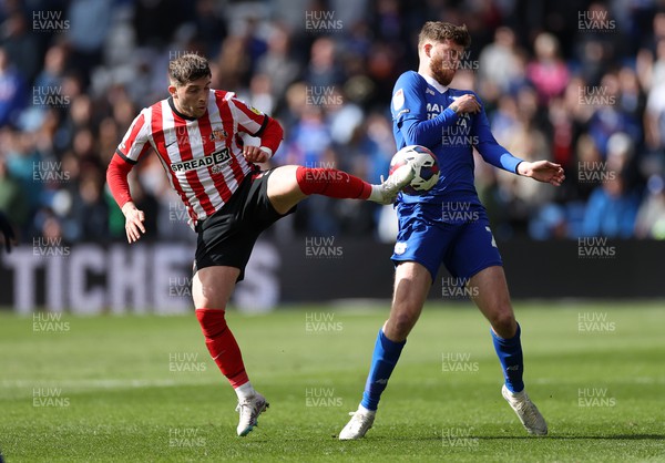 100423 - Cardiff City v Sunderland - SkyBet Championship - Lynden Gooch of Sunderland is challenged by Jack Simpson of Cardiff City 