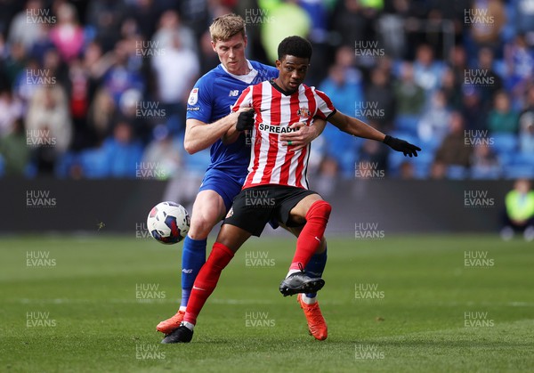 100423 - Cardiff City v Sunderland - SkyBet Championship - Amad Diallo of Sunderland is challenged by Mark McGuinness of Cardiff City 