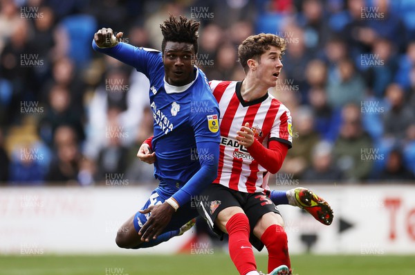100423 - Cardiff City v Sunderland - SkyBet Championship - Sory Kaba of Cardiff City is challenged by Trai Hume of Sunderland