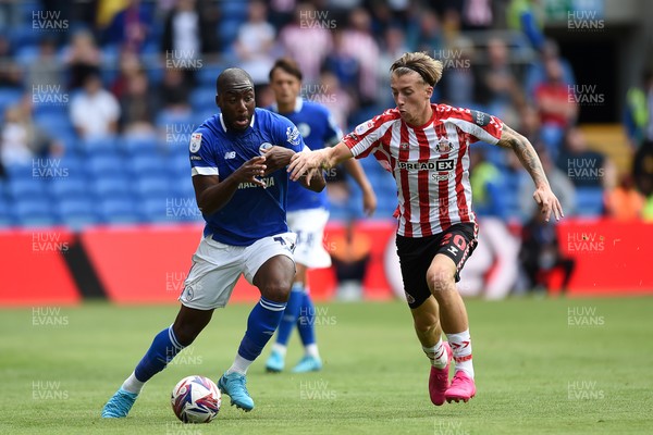 100824 - Cardiff City v Sunderland - Sky Bet Championship - Yakou Meite of Cardiff City is challenged by Jack Clarke of Sunderland