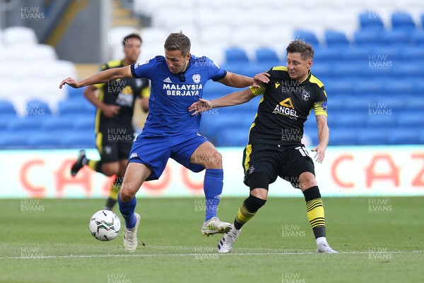 100821 - Cardiff City v Sutton United, EFL Carabao Cup - Will Vaulks of Cardiff City and Harry Beautyman of Sutton United compete for the ball