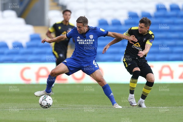 100821 - Cardiff City v Sutton United, EFL Carabao Cup - Will Vaulks of Cardiff City and Harry Beautyman of Sutton United compete for the ball