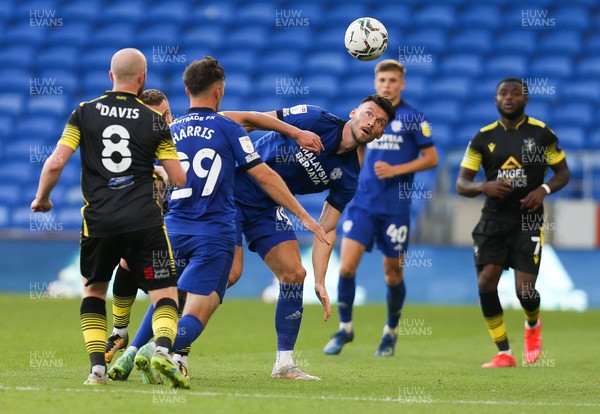 100821 - Cardiff City v Sutton United, EFL Carabao Cup - Kieffer Moore of Cardiff City looks to head the ball