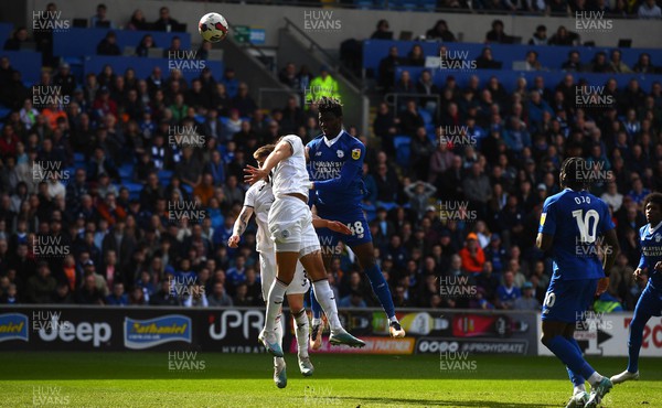 010423 - Cardiff City v Swansea City - EFL SkyBet Championship - Sory Kaba of Cardiff City heads a shot at goal