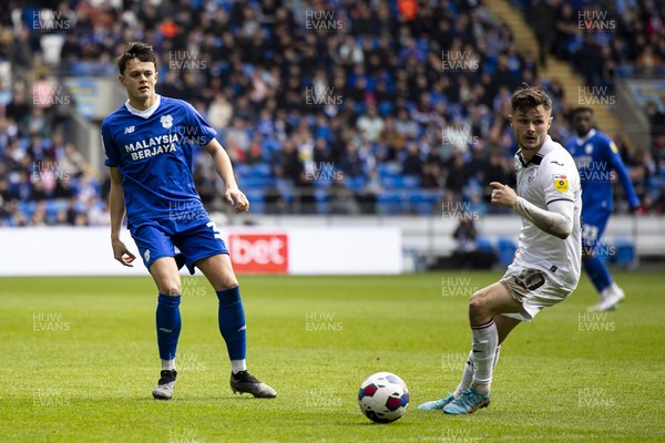010423 - Cardiff City v Swansea City - Sky Bet Championship - Perry Ng of Cardiff City in action against Liam Cullen of Swansea City