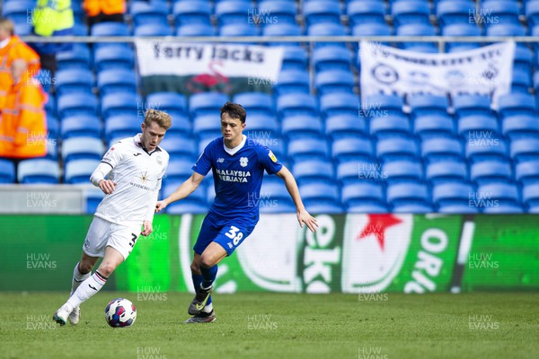 010423 - Cardiff City v Swansea City - Sky Bet Championship - Ollie Cooper of Swansea City in action against Perry Ng of Cardiff City
