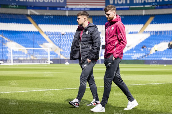 010423 - Cardiff City v Swansea City - Sky Bet Championship - Cameron Congreve and Swansea City goalkeeper Andy Fisher inspect the pitch ahead of the match
