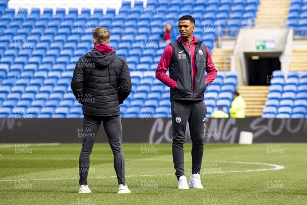 010423 - Cardiff City v Swansea City - Sky Bet Championship - Morgan Whittaker of Swansea City inspects the pitch ahead of the match