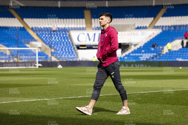 010423 - Cardiff City v Swansea City - Sky Bet Championship - Luke Cundle of Swansea City inspects the pitch ahead of the match