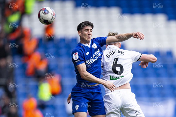 010423 - Cardiff City v Swansea City - Sky Bet Championship - Callum O'Dowda of Cardiff City & Harry Darling of Swansea City challenge for a header
