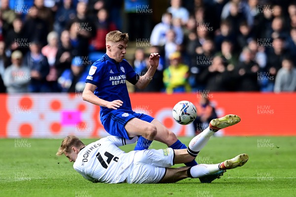 020422 - Cardiff City v Swansea City - Sky Bet Championship - Joel Bagan of Cardiff City is tackled by Flynn Downes of Swansea City 