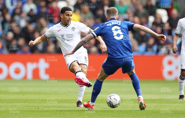 020422 - Cardiff City v Swansea City, South Wales derby - SkyBet Championship - Ben Cabango of Swansea City is challenged by Joe Ralls of Cardiff City