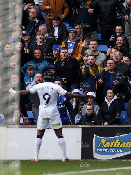 020422 - Cardiff City v Swansea City, South Wales derby - SkyBet Championship - Michael Obafemi of Swansea City celebrates scoring a goal in front of the Cardiff fans