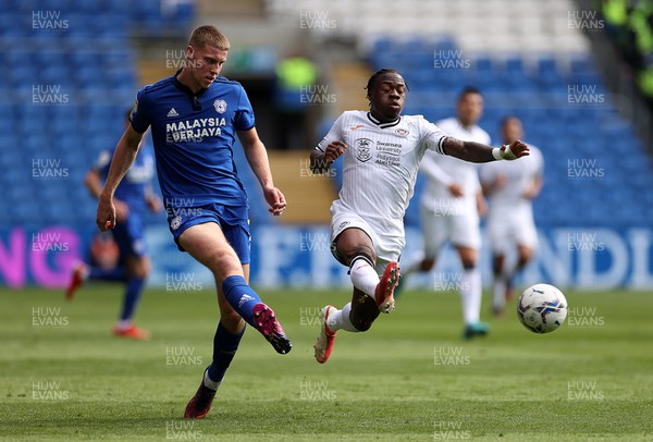 020422 - Cardiff City v Swansea City, South Wales derby - SkyBet Championship - Mark McGuinness of Cardiff City is challenged by Michael Obafemi of Swansea City