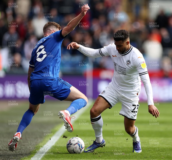 020422 - Cardiff City v Swansea City, South Wales derby - SkyBet Championship - Cyrus Christie of Swansea City tackles Joe Ralls of Cardiff City