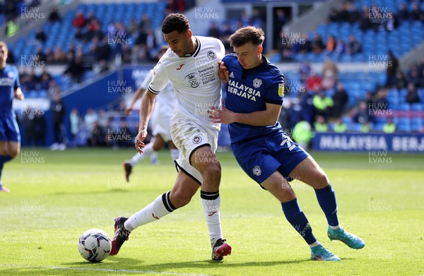 020422 - Cardiff City v Swansea City, South Wales derby - SkyBet Championship - Ben Cabango of Swansea City is challenged by Mark Harris of Cardiff City
