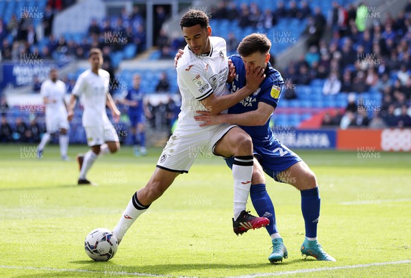 020422 - Cardiff City v Swansea City, South Wales derby - SkyBet Championship - Ben Cabango of Swansea City is challenged by Mark Harris of Cardiff City