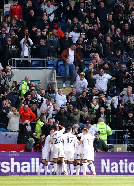 020422 - Cardiff City v Swansea City, South Wales derby - SkyBet Championship - Ben Cabango of Swansea City celebrates scoring a goal with team mates in front of the away end