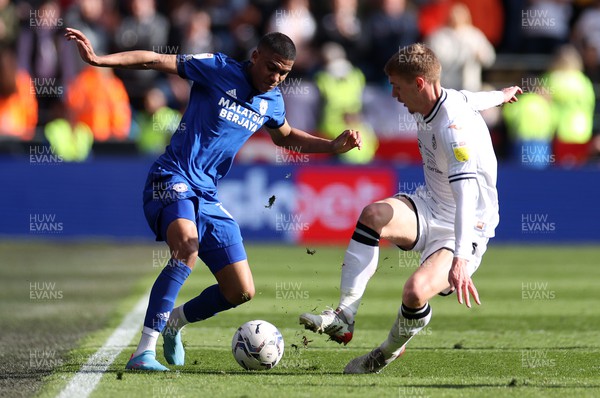 020422 - Cardiff City v Swansea City, South Wales derby - SkyBet Championship - Cody Drameh of Cardiff City is challenged by Jay Fulton of Swansea City